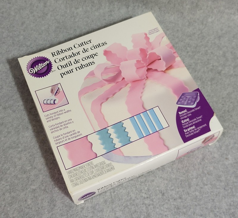 Wilton Fondant Ribbon Cutter 24-Pc. Set with Bonus Storage Case Cake Decorating gallery