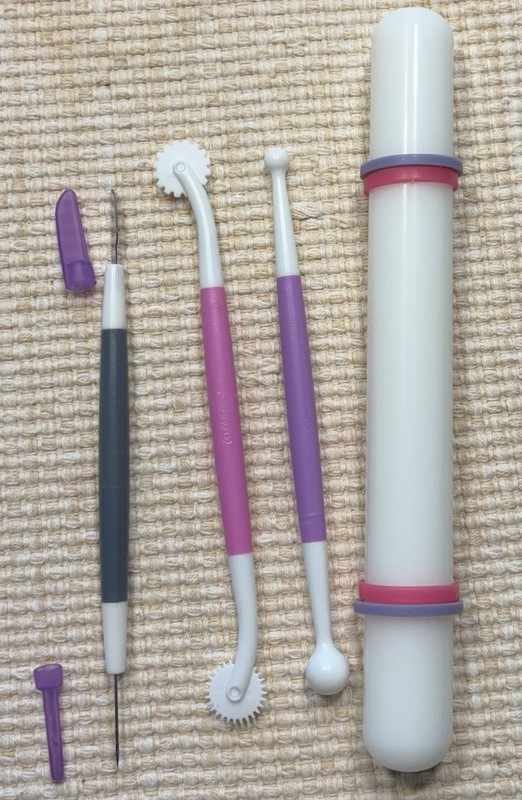 Wilton’s Fondant Kit w/ Rolling Pen, Crimping Tool & Mold Tools gallery