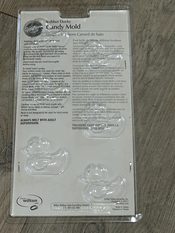 Lot of 3 Wilton Molds Lollipop, Rubber Ducky, and Mummy Pretzel Baking Treats gallery
