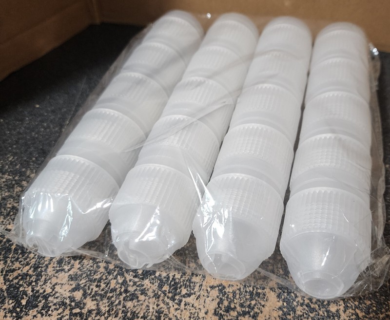 Lot of New Couplers in Multiple Sizes and 20 Silicone? Tips or Covers for Baking gallery