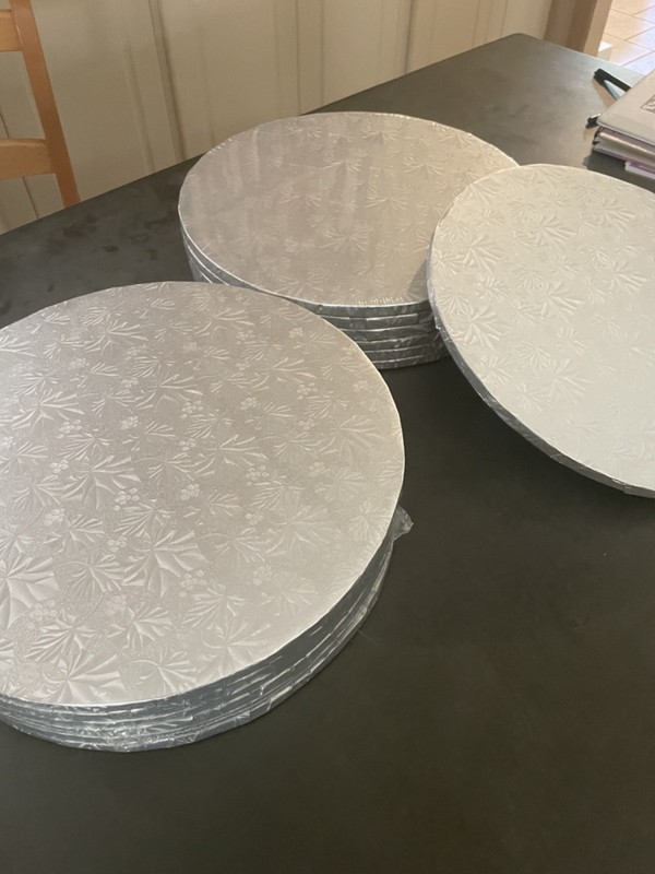 Lot of 13 14″ Cake bases, drums, silver foil, 1/2 inch thick brand new