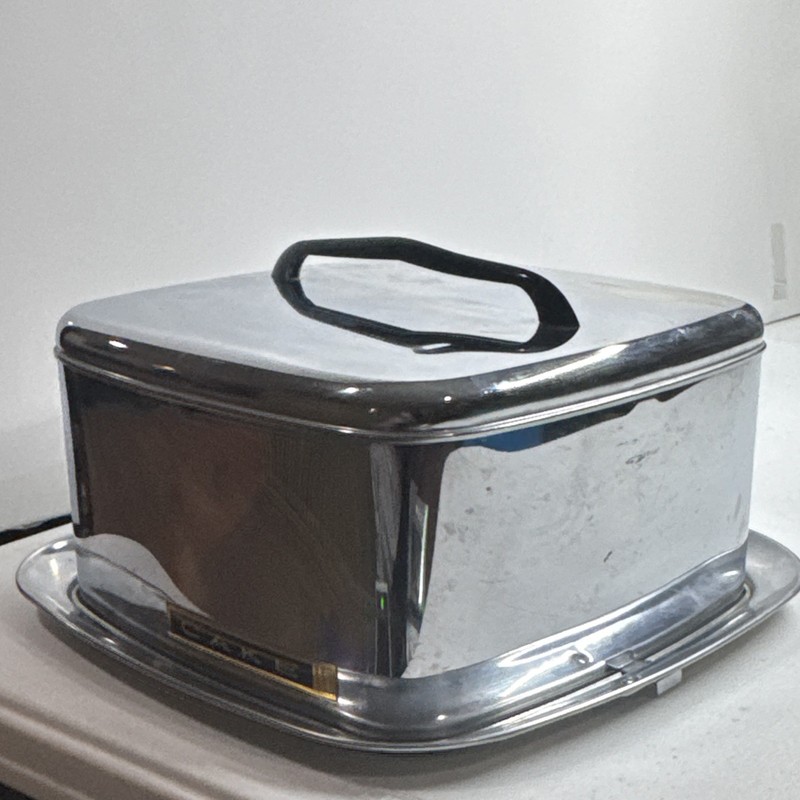 vintage Lincoln Beautyware chrome cake carrier with a black handle gallery