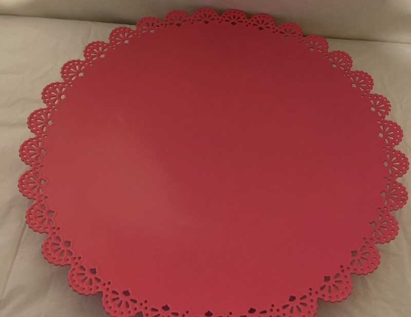 Pink Metal Cake Stand 12″ With A 1″ Doiley Decoration Around the Edge