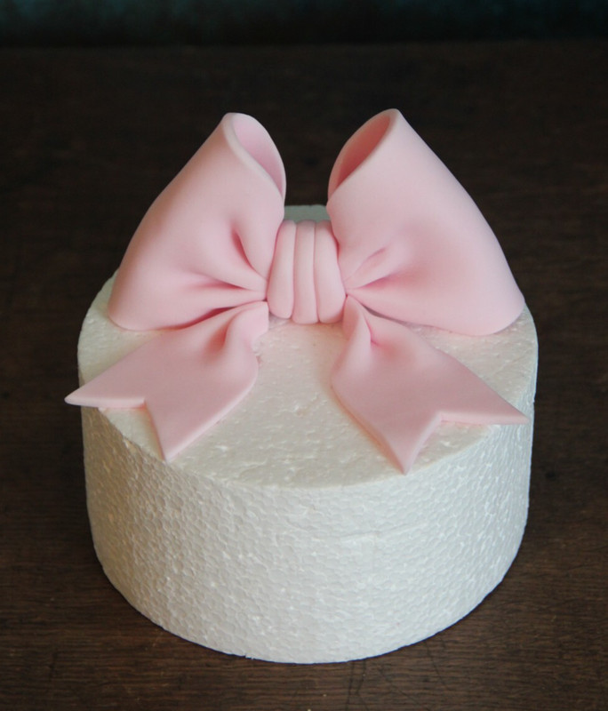 Handmade fondant 5" bow with ribbons cake topper gallery