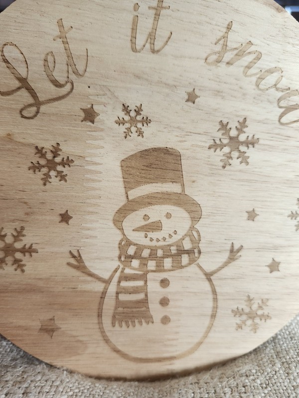 7 Inch Wooden Cake Stand With The Phrase "Let It Snow" With Snowman And Flakes gallery