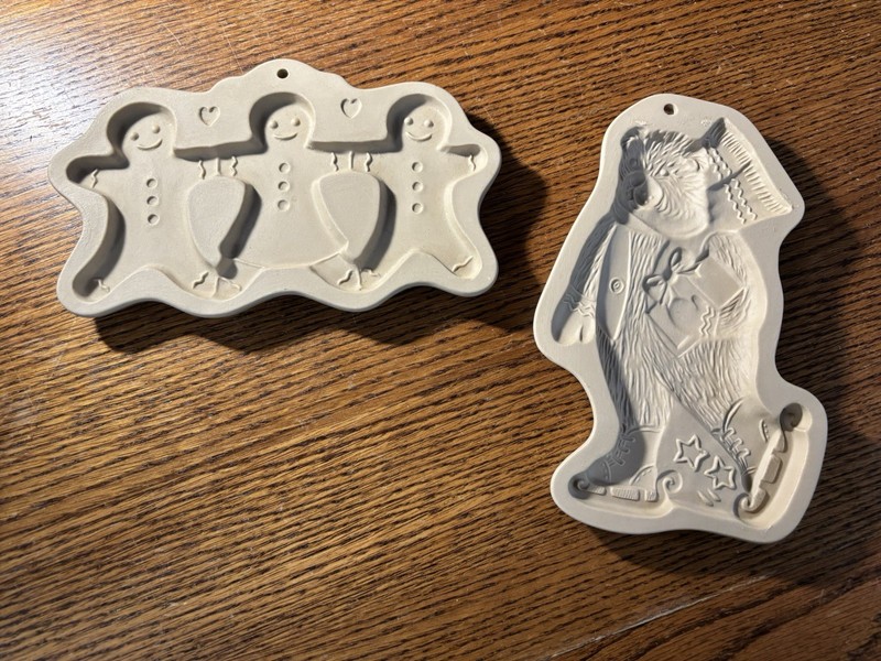 Pair of Brown Bag Cookie Art molds, skating bear and gingerbread cut aparts
