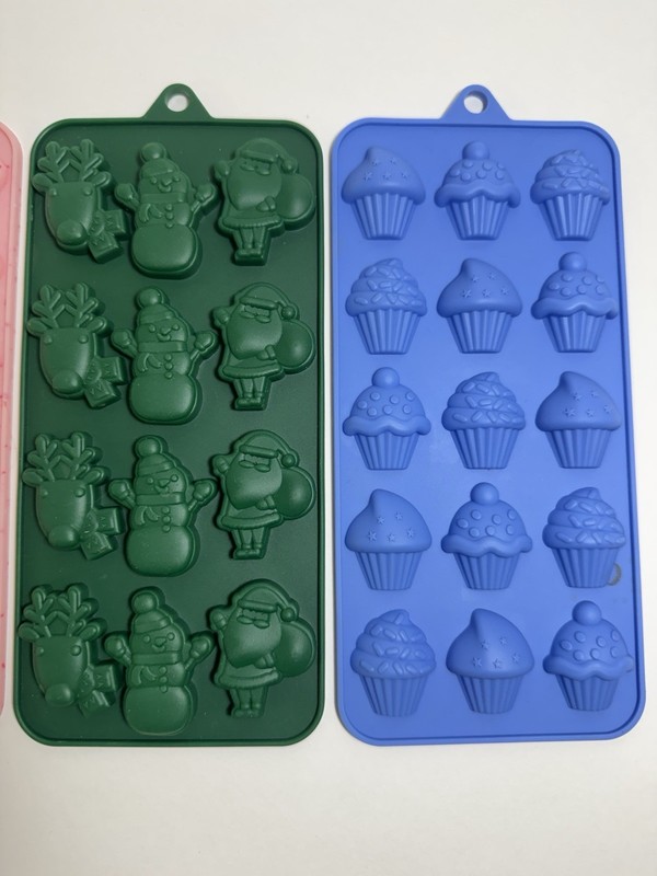 Four Wilton Silicone Candy Molds Hearts, Cupcakes, Stars, Holiday gallery