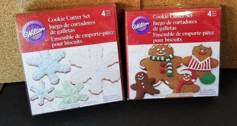 NIP Wilton Nesting Snowflake & Gingerbread Man Metal 4 Pcs Cookie Cutter Set
