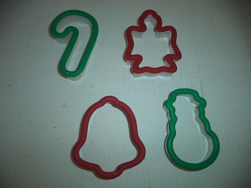 Four Holiday Cookie Cutters Angel Candy Cane Snowman And Bell