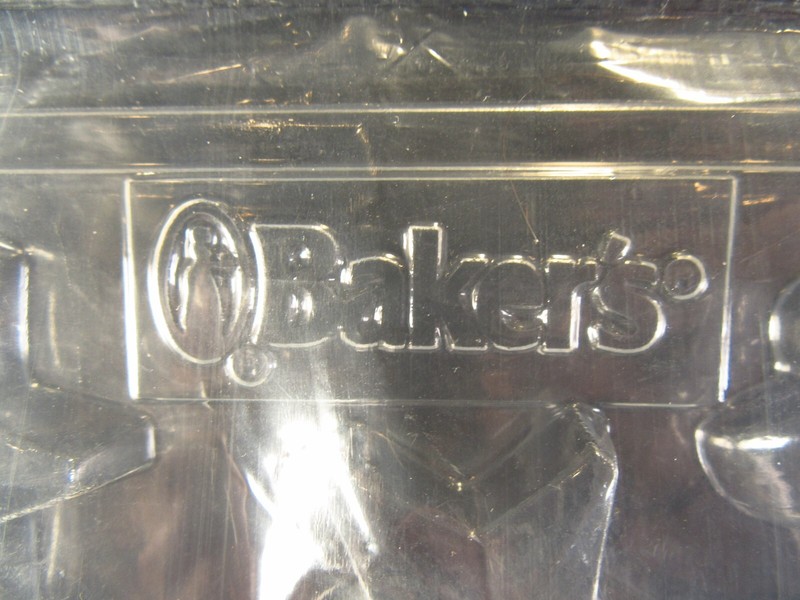 4 Small Christmas Chocolate Candy Molds Bow, Bell, Santa, Candy Cane gallery