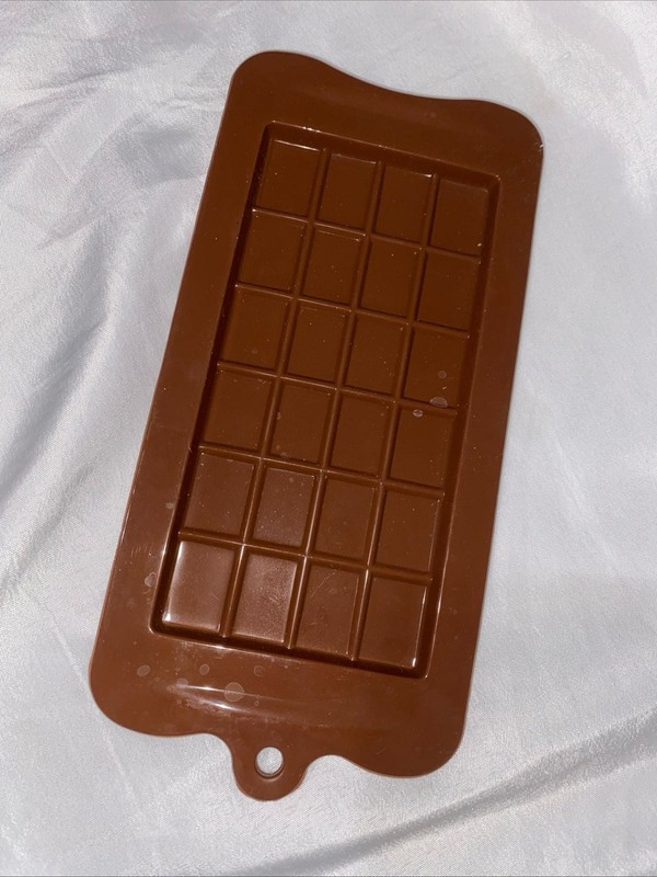 Silicone Kitchen pieces: 1- Bowl Scraper, 1- Chocolate Bar Mold, 2- Gummy Bear M gallery