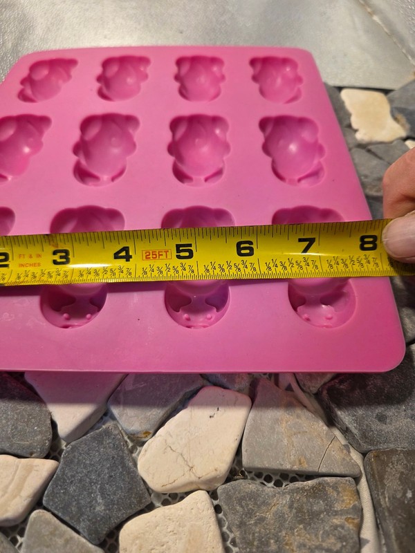 This is a pink Mobi 12 Little Pigs in a Blanket Silicone Baking Mold. gallery