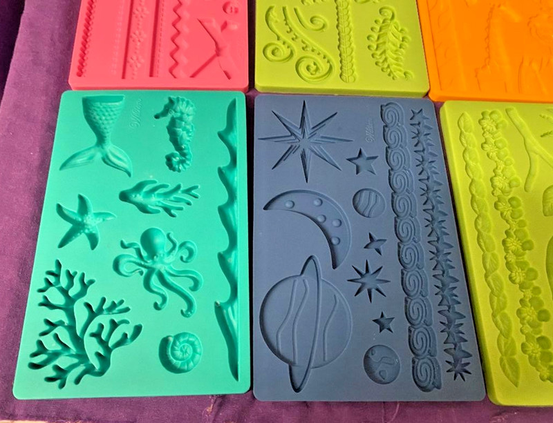 Wilton Silicone fondant molds space water leaves jungle shells buttons Lot of 8 gallery