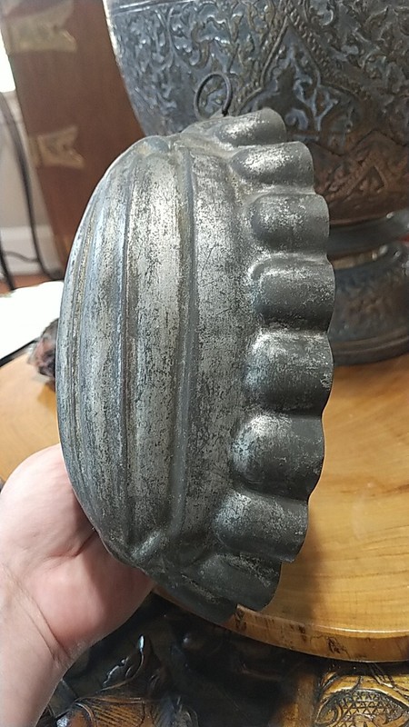 Vintage stamped tin primitive cake mold. looks like a squash? with ruffles gallery