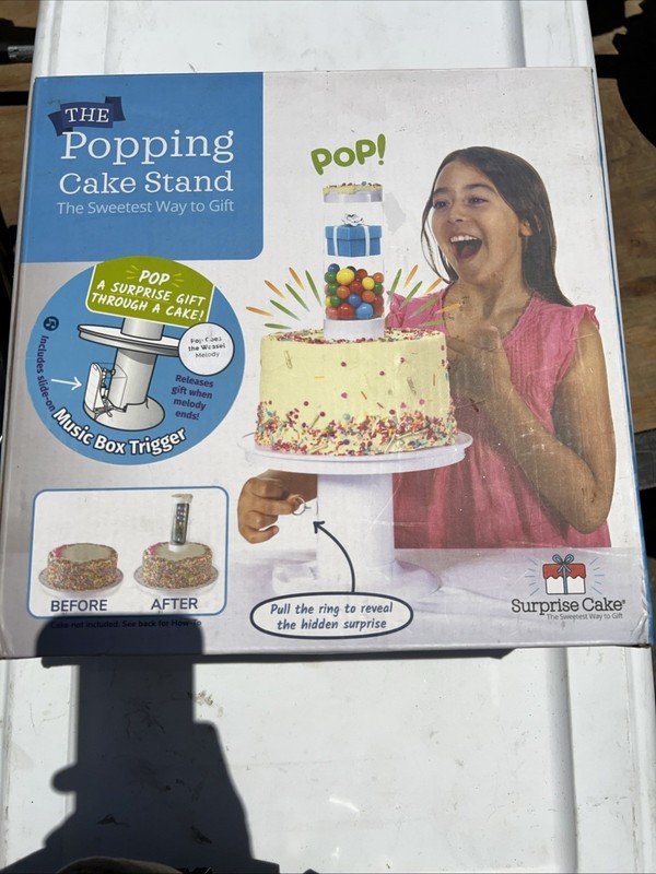 The Popping Cake Stand- A Surprise Gift through a cake – new in box.