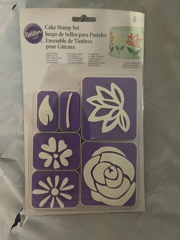 Lot Of 5 Wilton Cake Stamps gallery