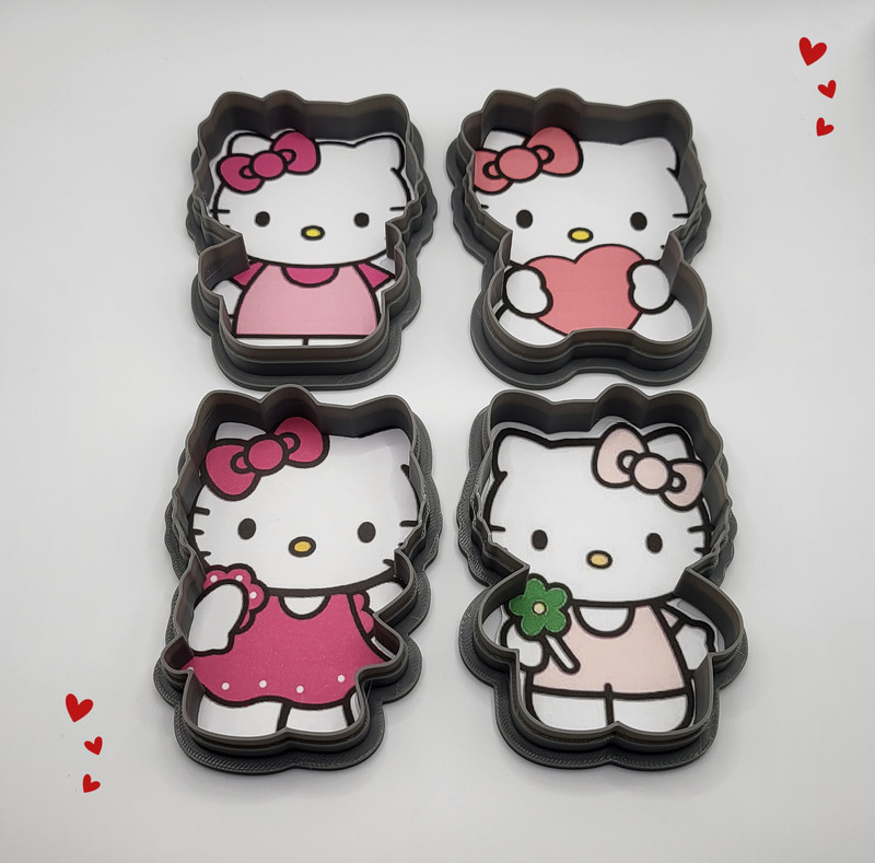 Hello Kitty Themed Cookie Cutter Set of 4 Holding a Heart, Flower and in a Dress gallery
