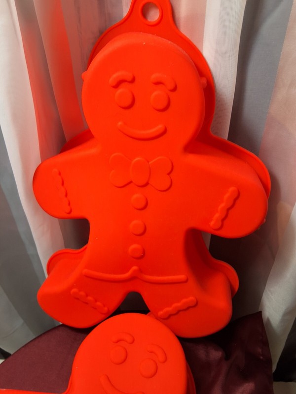 2 GINGERBREAD MEN SILICONE MOLDS, RED PREOWNED, NEVER USED gallery