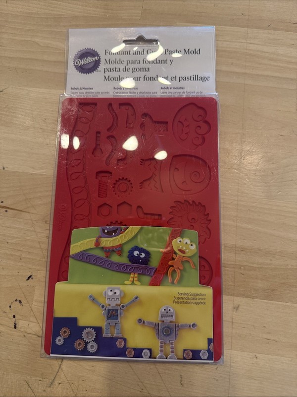 Wilton Fondant & Gum Paste Silicone Mold 5″X7.75″ Robots & Monsters