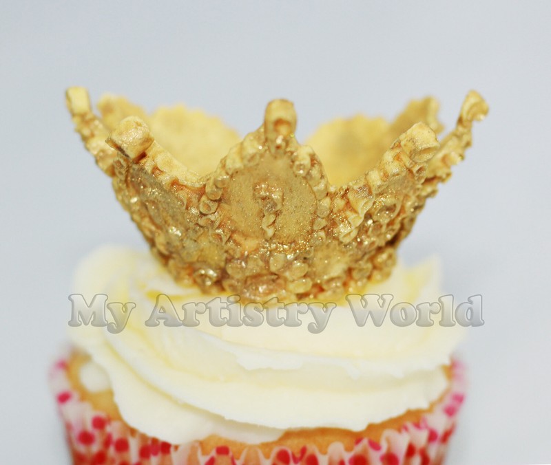 A set of six edible fondant crown cupcake toppers. Any other color possible