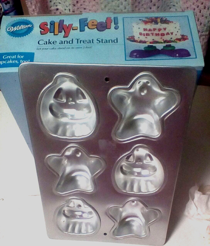Cake or cupcake Stand with silly Feet plus Halloween cupcake pan Wilton lot