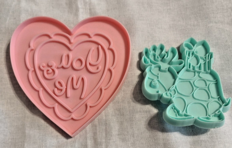 2 PLASTIC PRECIOUS MOMENTS COOKIE CUTTERS HEART AND TURTLE BY SAM BUTCHER