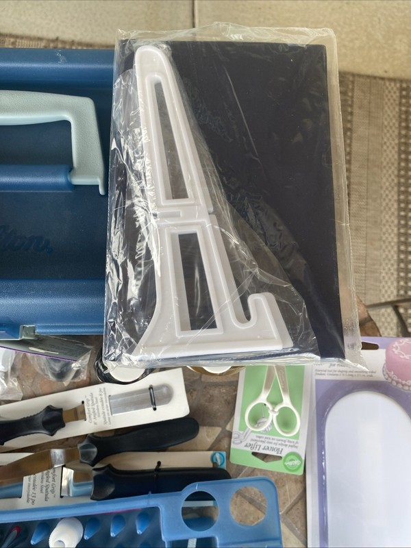 Wilton Cake Decorating Kit (52 Individual Items) Plus the case. gallery