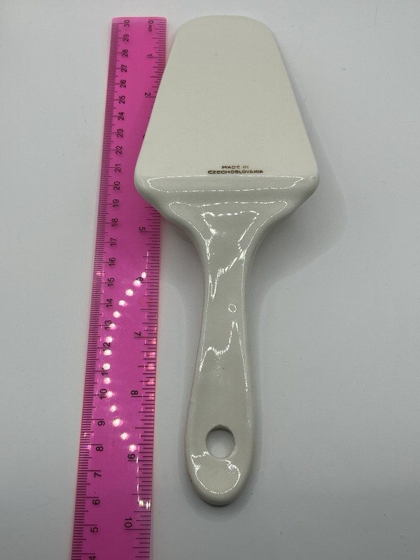 Ceramic/porcelain Cake Or Pie server with floral print and decorative handle. gallery