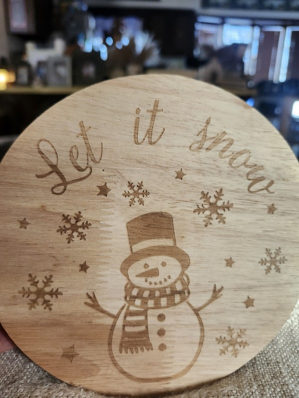 7 Inch Wooden Cake Stand With The Phrase "Let It Snow" With Snowman And Flakes gallery