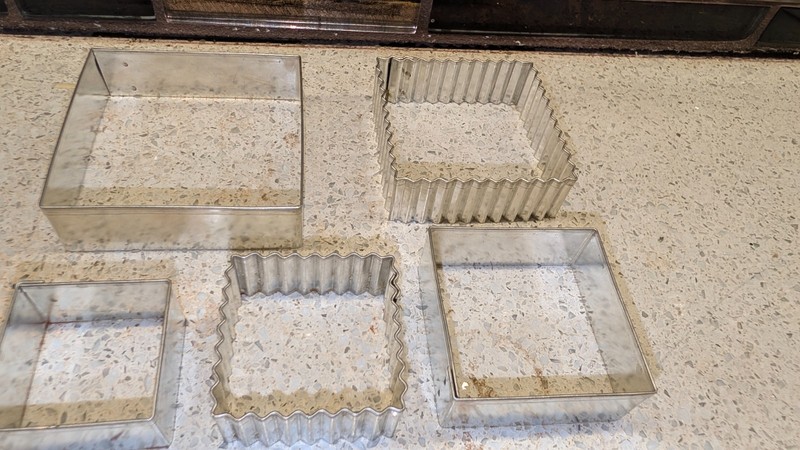 Set of 5 Stainless Steel Mix of Flat and Fluted Square Cookie Cutters in 4" Tin gallery