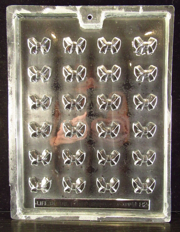 4 Small Christmas Chocolate Candy Molds Bow, Bell, Santa, Candy Cane gallery