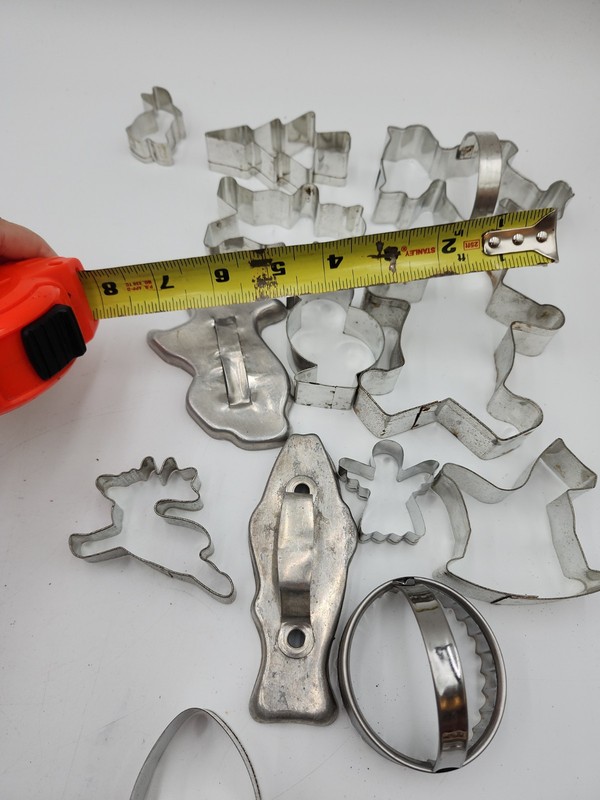 Huge lot of vintage tin handle large small Cookie Cutters Disney Cactus Xmas Cow gallery