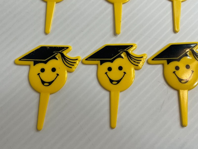 Vintage 1990s Lot of 11 - Smily Face Graduation Cap - Cupcake / Cake Toppers gallery