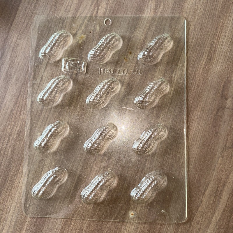One Plastic Candy Mold – 12 Peanuts on the tray – Mardi Gras 0128 – Used
