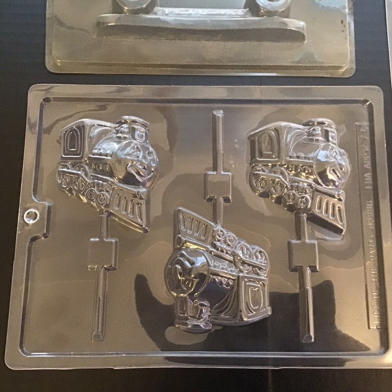 Vintage Plastic Candy Molds Lot Of 7, Carnival, Skateboard, Merry Go Round gallery