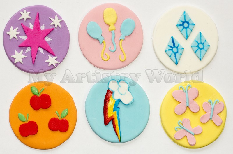 A set of 12 edible My Little Pony cutie marks cupcake toppers.