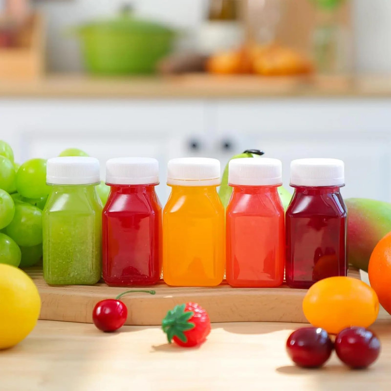 10 Piezas Botellas Plastico 2oz Con Tapas Para Shot Jengibre Congelador BPA gallery