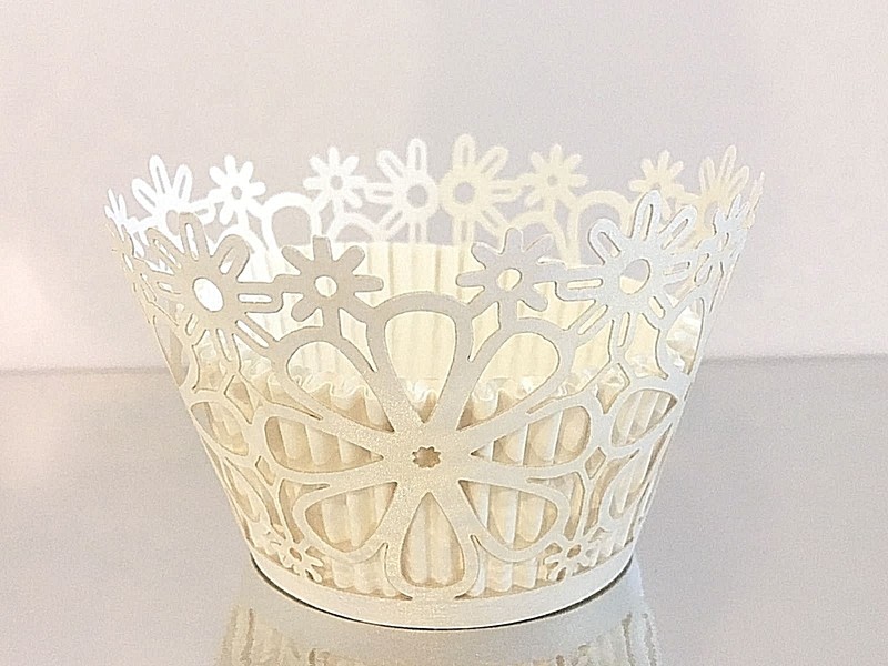 Set of 12 Beautiful White Cupcake Wrappers.