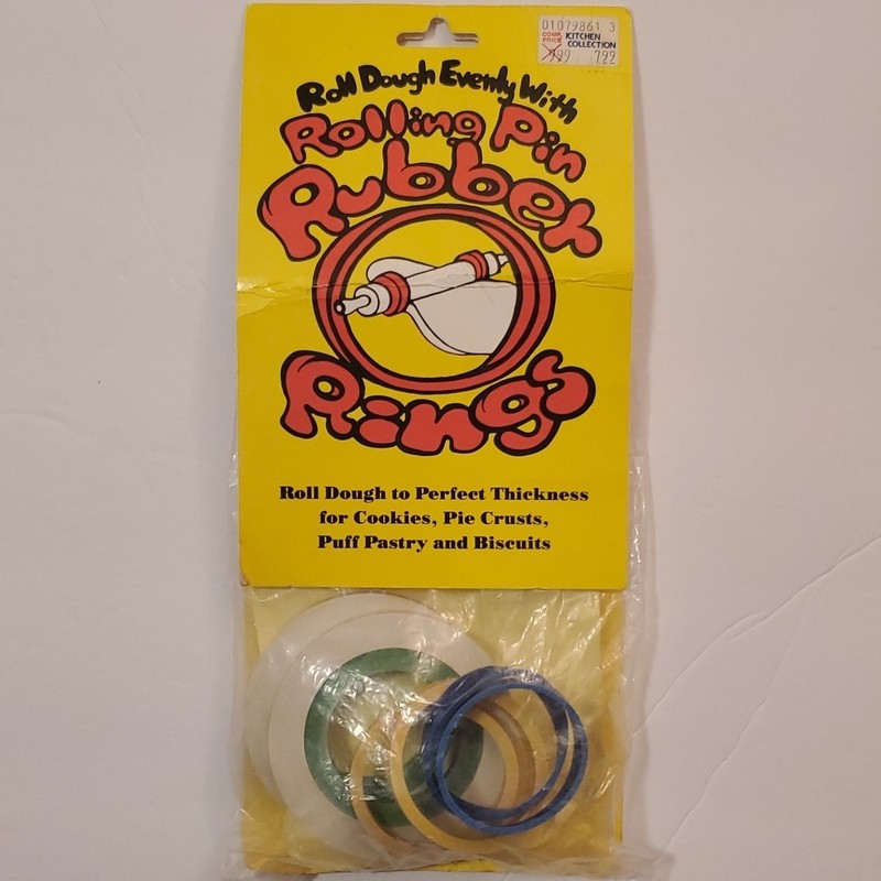Roll dough evenly with Rolling Pin Rubber Rings New old stock