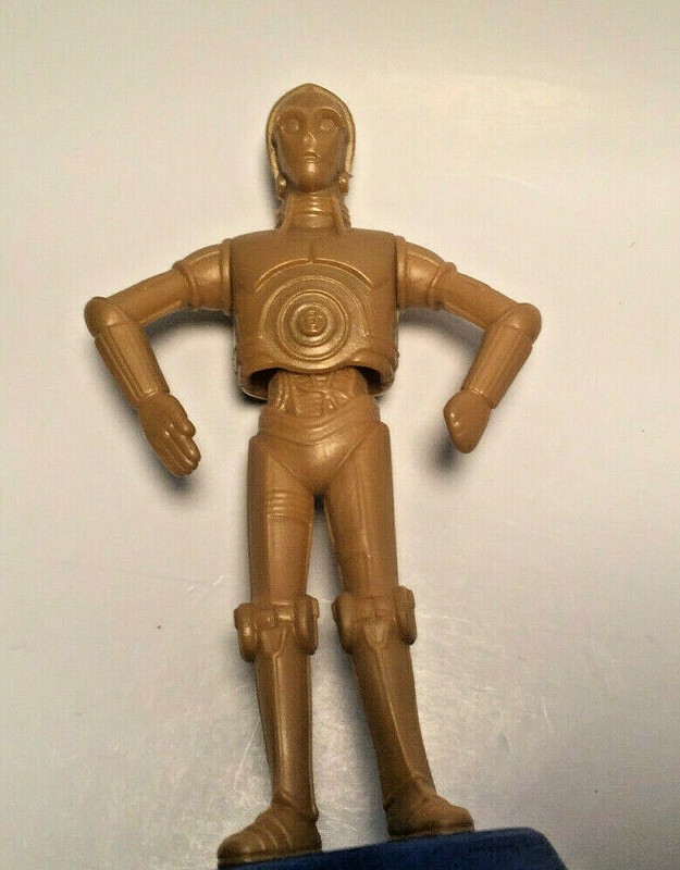 Star Wars C-3PO cake topper or toy – top part moves, about 4 inches high C3PO