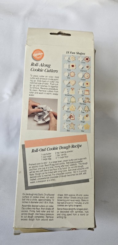 Wilton Roll-Along Cookie Cutters,6 Cookies at a Time, 18 Interchangeable Cutters gallery