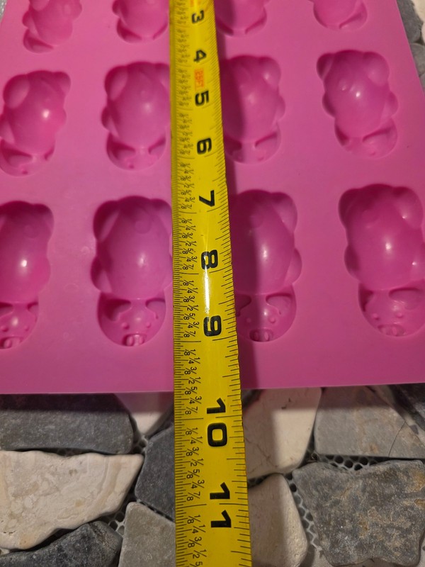 This is a pink Mobi 12 Little Pigs in a Blanket Silicone Baking Mold. gallery
