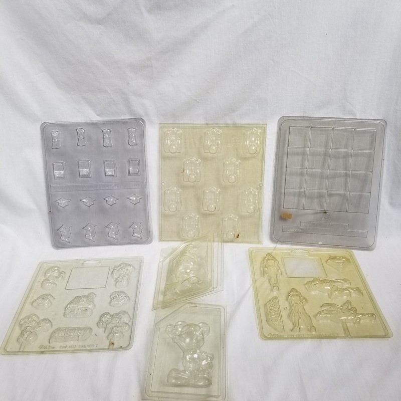 Lot of 7 Vintage Apollo And Wilton Plastic Candy Molds Superhero Disney ETC