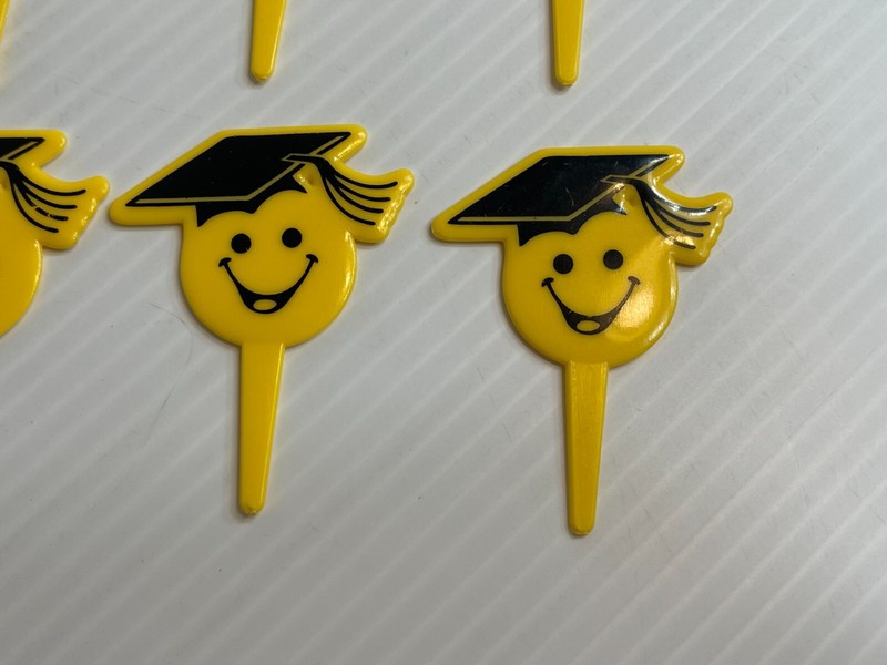Vintage 1990s Lot of 11 - Smily Face Graduation Cap - Cupcake / Cake Toppers gallery