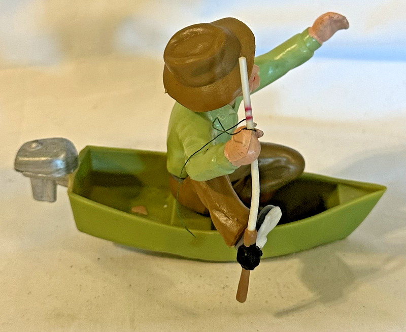 1978 Wilton Cake Topper Frustrated Fisherman in Boat Hong Kong gallery