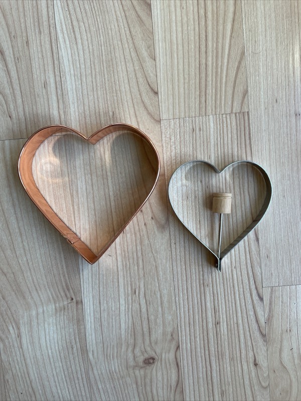 Set of 2 Cookie Cutters Heart-Shaped 1 Copper/ 1 Silver Metal with Wood Handle gallery