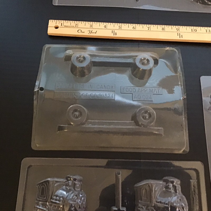 Vintage Plastic Candy Molds Lot Of 7, Carnival, Skateboard, Merry Go Round gallery