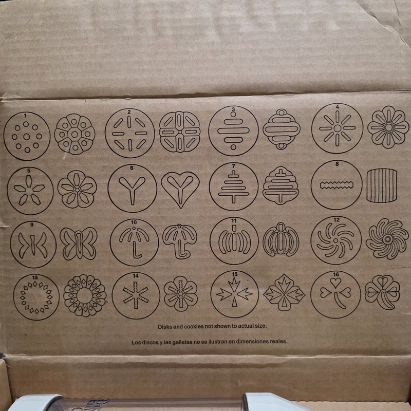 The Pampered Chef Cookie Press 16 Disc 1525 Retired Set (15 discs included) gallery
