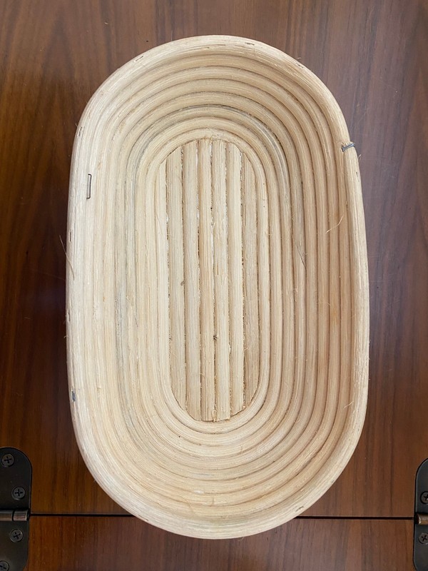 Used oval coiled wood proofing bread dough bowl. Great for sourdough or rustic.