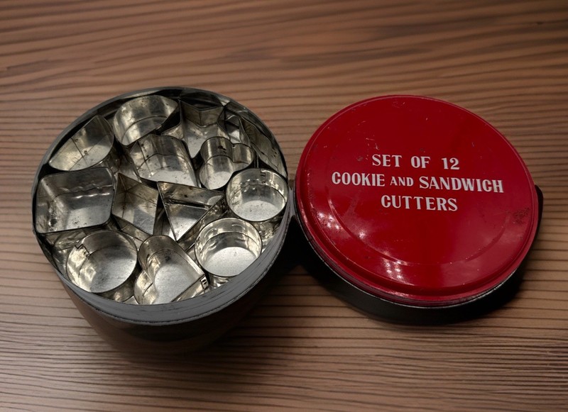 tin can with 12 tin / metal miniature / small cookie / sandwich cutters